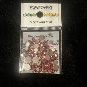 Nail art and makeup Swarovski Crystals pink